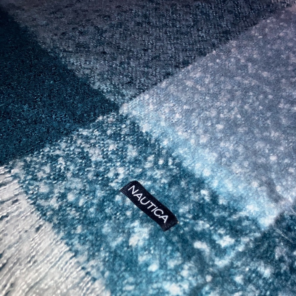 Nautica supersoft plush-knit blanket/throw. Fringed throw adds warm/cozy touch!